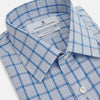 View 2 of product The Turnbull & Asser Blue Graph Overlay Check Mayfair Shirt features long sleeves, a spread collar, buttoned cuffs, and a blue and white plaid pattern, shown against a plain white background.