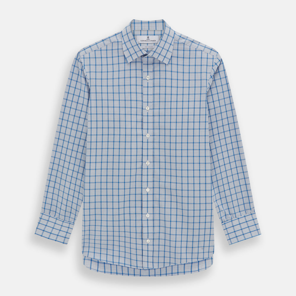 The Turnbull & Asser Blue Graph Overlay Check Mayfair Shirt features long sleeves, a spread collar, buttoned cuffs, and a blue and white plaid pattern, shown against a plain white background.