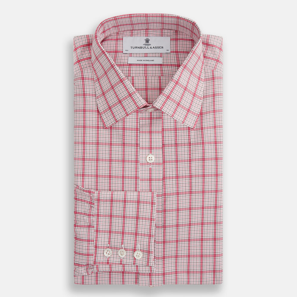 The Turnbull & Asser Pink Graph Overlay Check Mayfair Shirt features a classic collar, long sleeves, and a pink check pattern. Crafted from organic cotton, it is showcased against a plain white background.