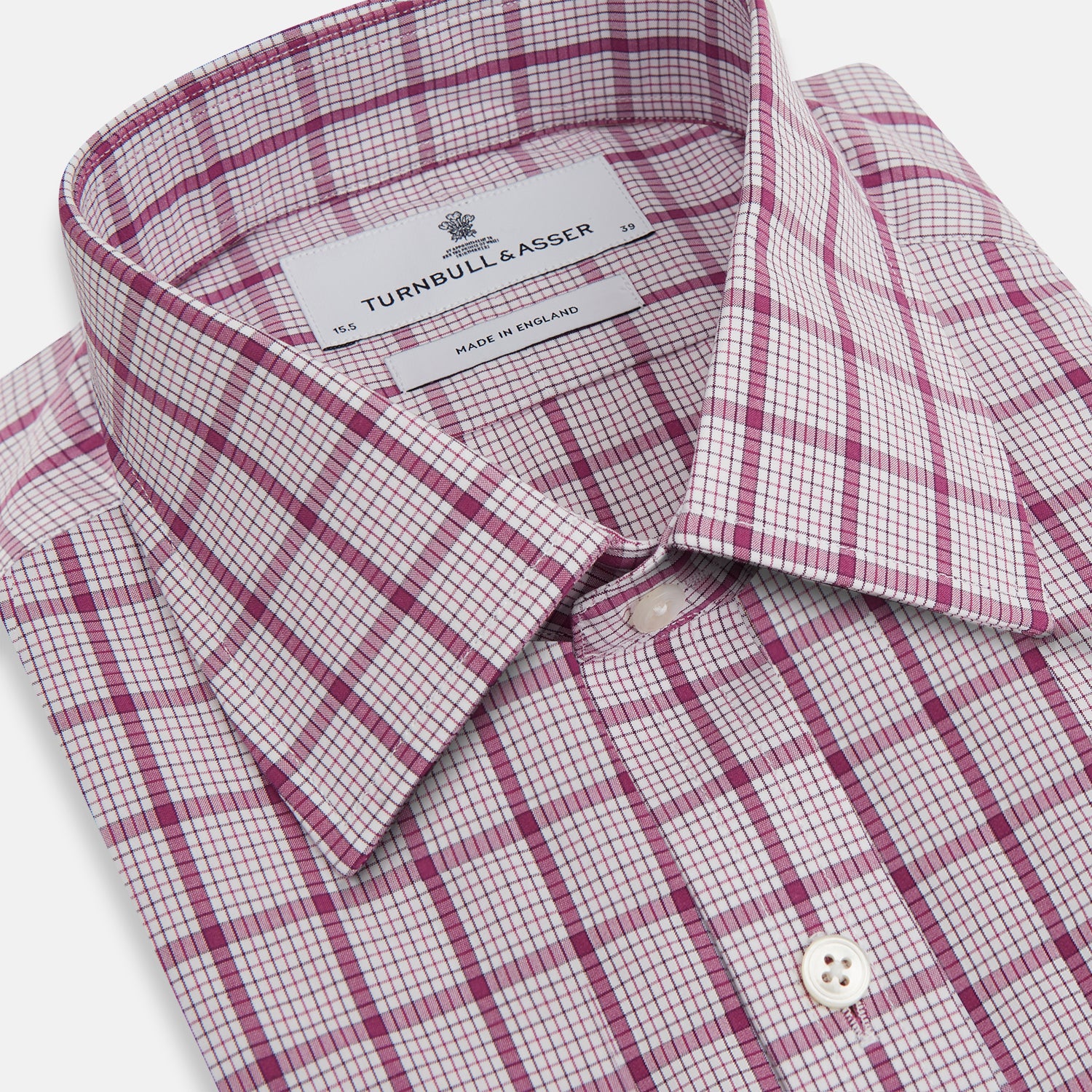 View 2 of product The Turnbull & Asser Purple Graph Overlay Check Mayfair Shirt is a long-sleeve, button-up shirt with a check pattern, classic collar, and buttoned cuffs, displayed against a plain white background.