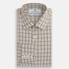 View 4 of product The Turnbull & Asser Brown Graph Overlay Check Mayfair Shirt, an organic cotton long-sleeve button-up with collar and cuffed sleeves, features a beige and white check pattern and is shown laid flat on a white background.