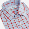 View 2 of product The Red Windowpane Check Mayfair Shirt by Turnbull & Asser is crafted from organic cotton in light blue with red and white windowpane checks, shown against a plain white background.