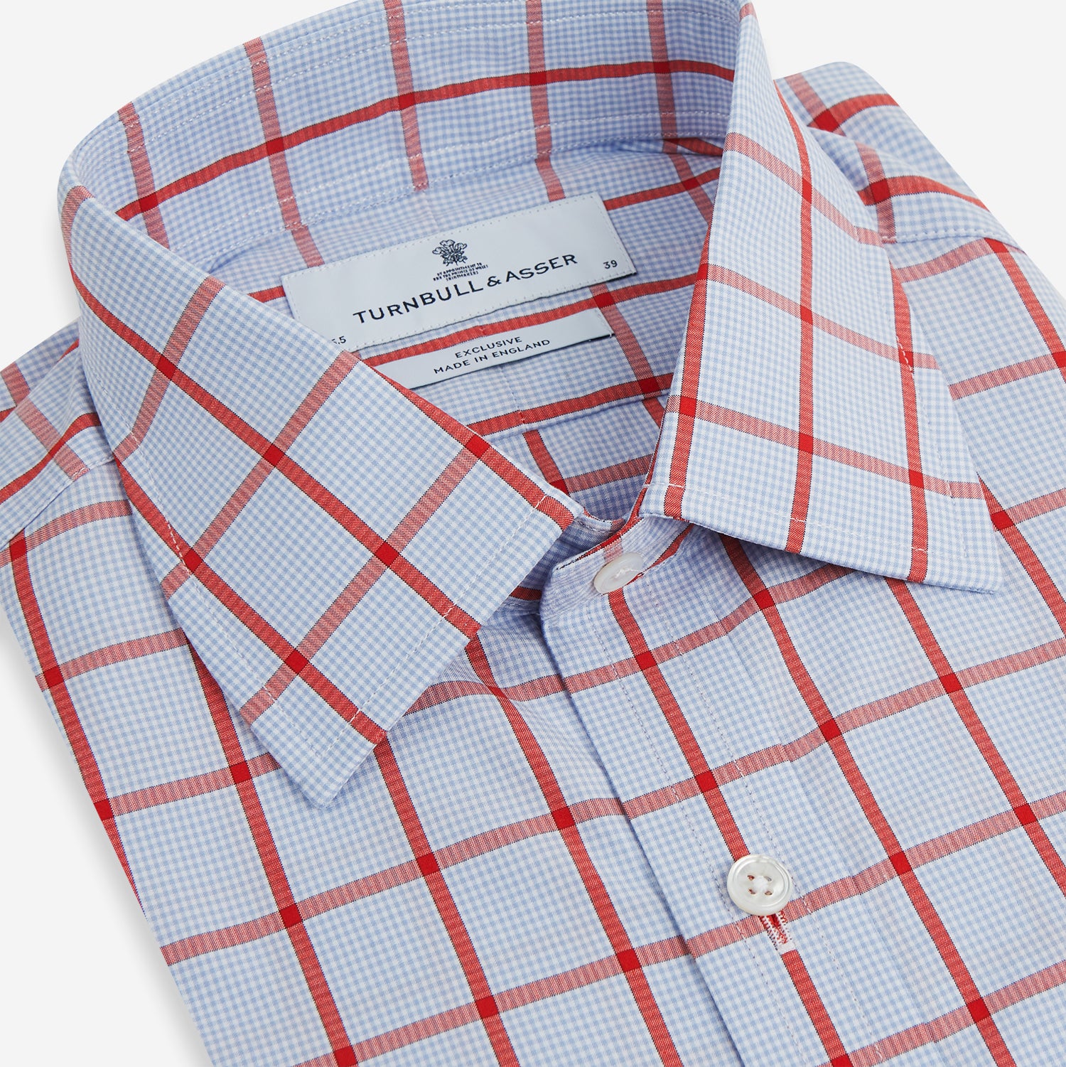 View 2 of product The Red Windowpane Check Mayfair Shirt by Turnbull & Asser is crafted from organic cotton in light blue with red and white windowpane checks, shown against a plain white background.