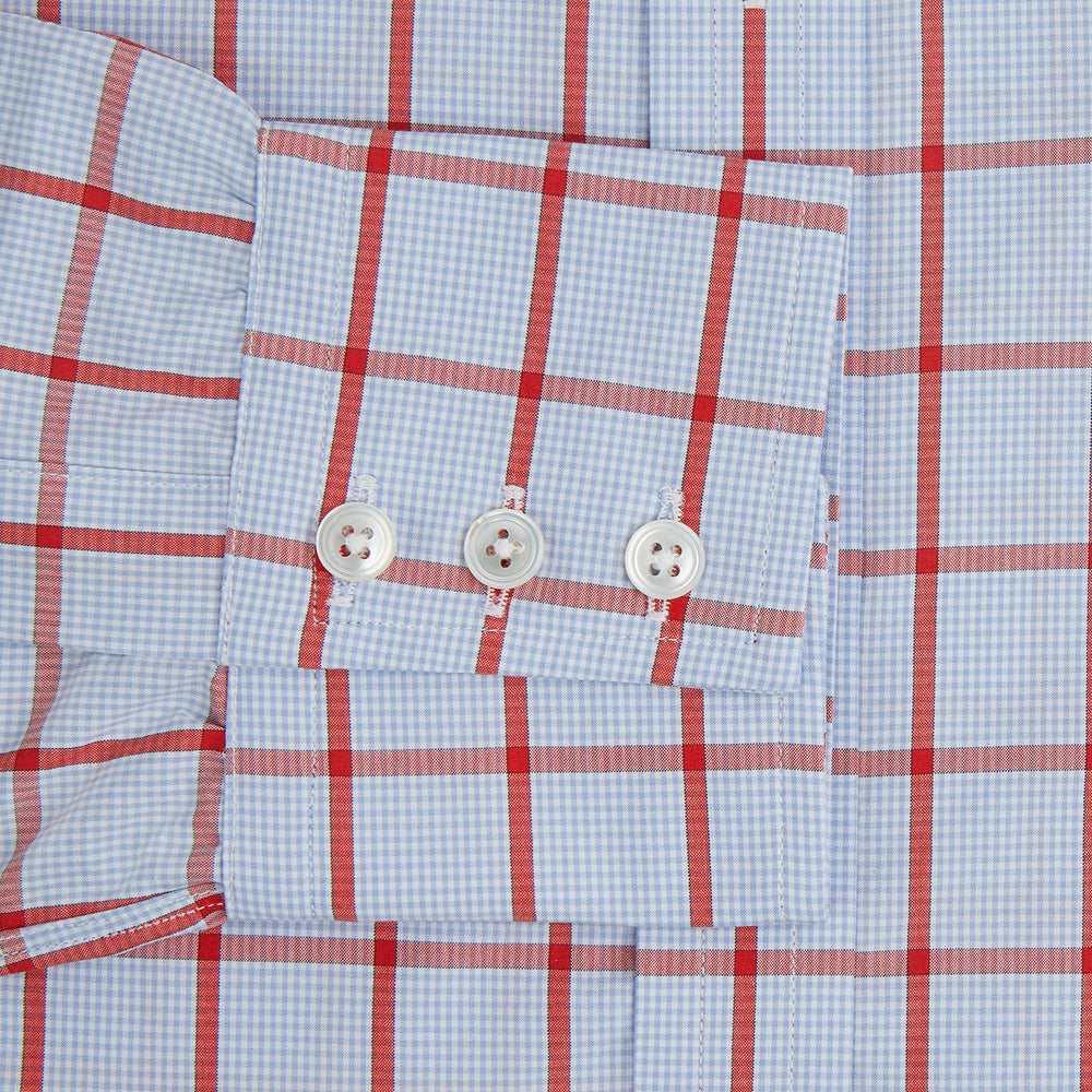 The Red Windowpane Check Mayfair Shirt by Turnbull & Asser is crafted from organic cotton in light blue with red and white windowpane checks, shown against a plain white background.