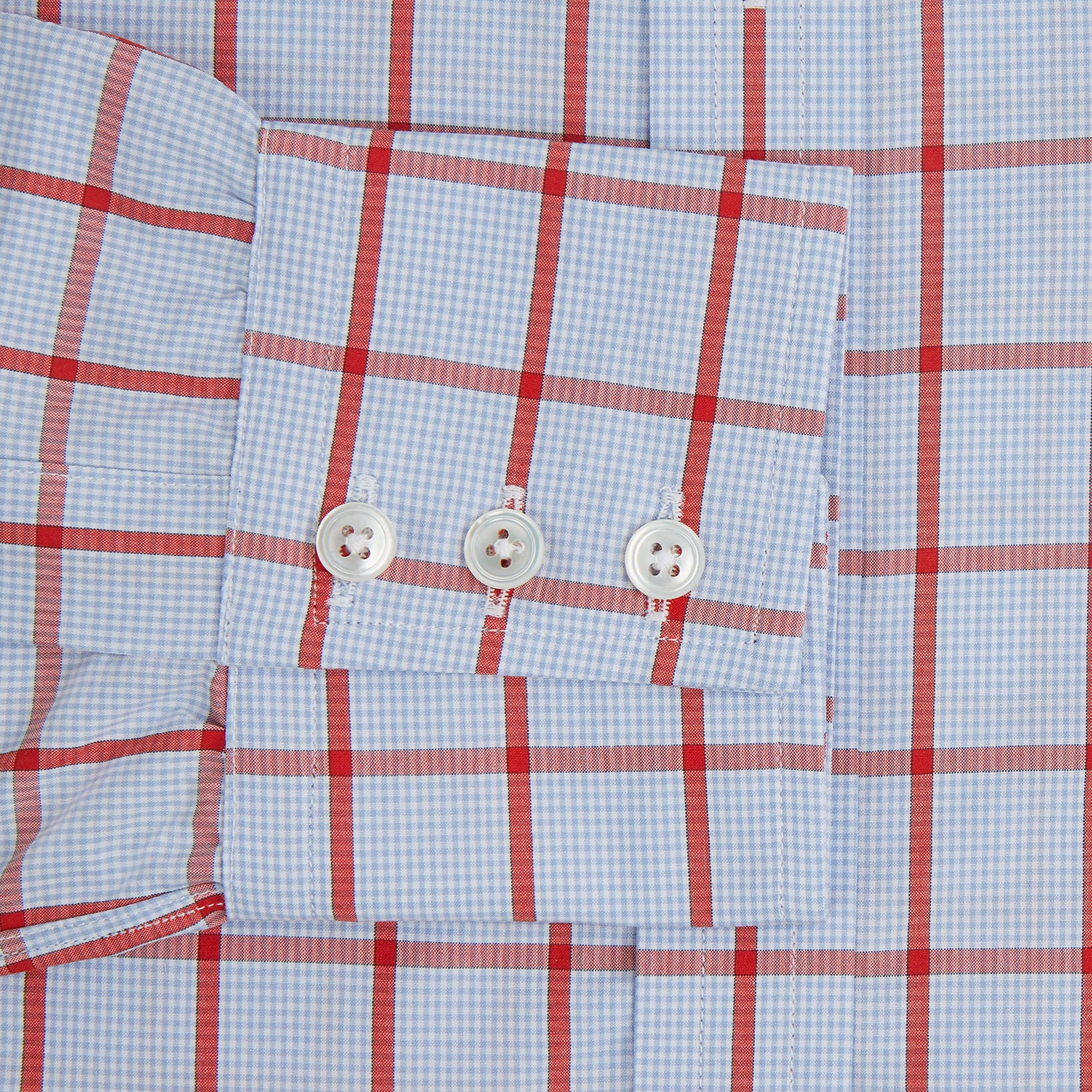 View 3 of product The Red Windowpane Check Mayfair Shirt by Turnbull & Asser is crafted from organic cotton in light blue with red and white windowpane checks, shown against a plain white background.