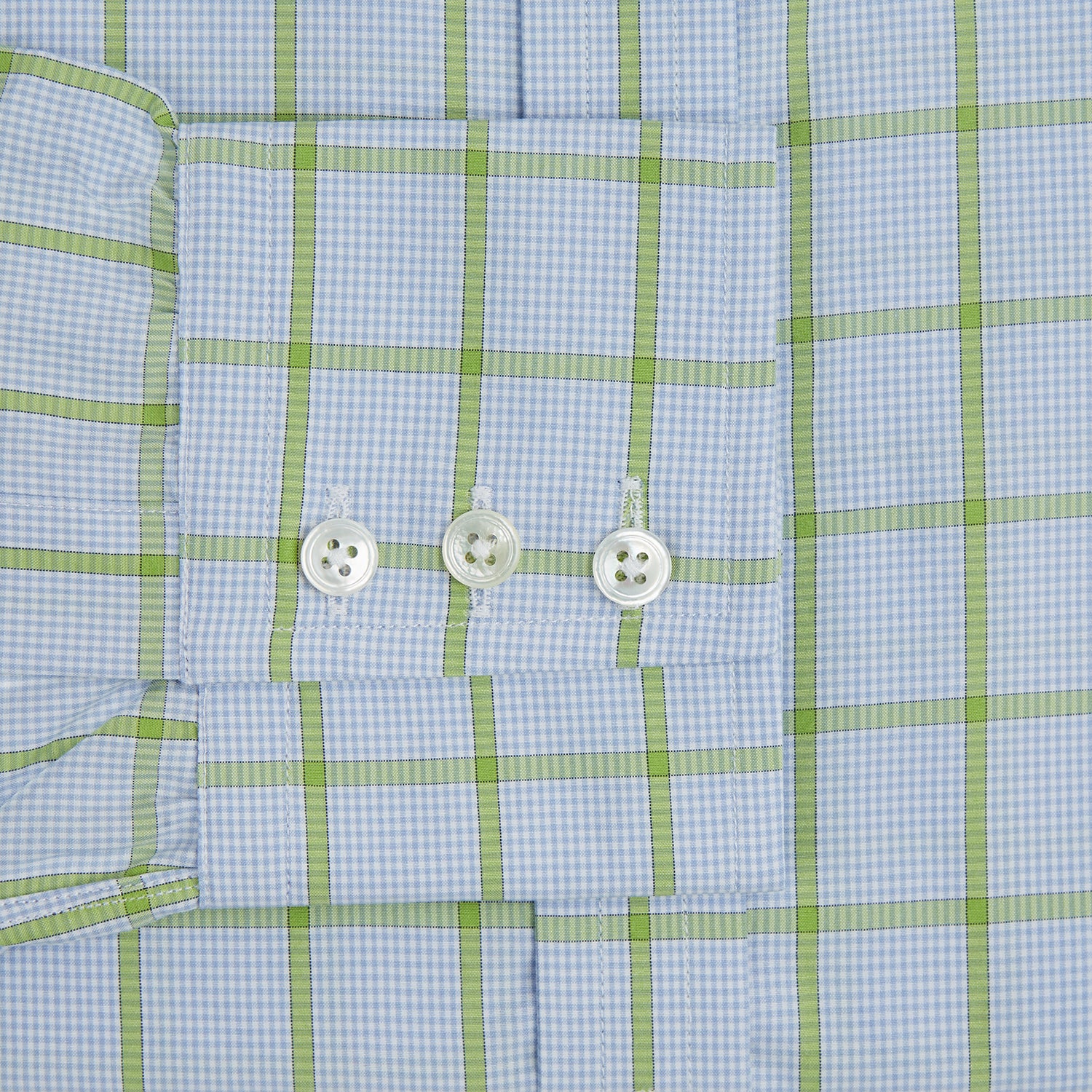 View 3 of product The Turnbull & Asser Light Green Windowpane Check Mayfair Shirt, crafted from organic cotton with a classic collar and buttoned cuffs, is displayed on a plain white background.