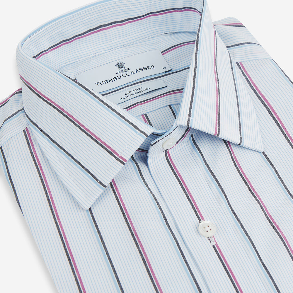 The Blue and Pink Shadow Stripe Mayfair Shirt by Turnbull & Asser features a T&A collar, long sleeves, buttoned cuffs, and a relaxed fit. Made from organic cotton with blue and pink shadow stripes for effortless style.