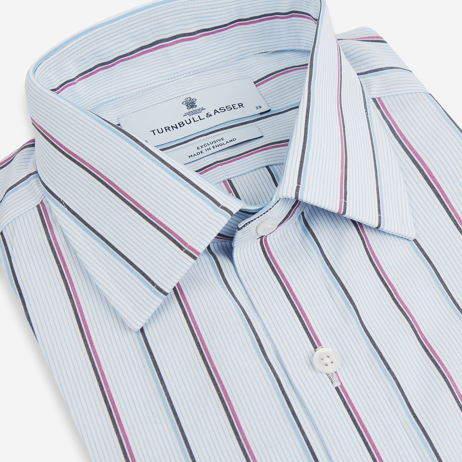 View 2 of product The Blue and Pink Shadow Stripe Mayfair Shirt by Turnbull & Asser features a T&A collar, long sleeves, buttoned cuffs, and a relaxed fit. Made from organic cotton with blue and pink shadow stripes for effortless style.