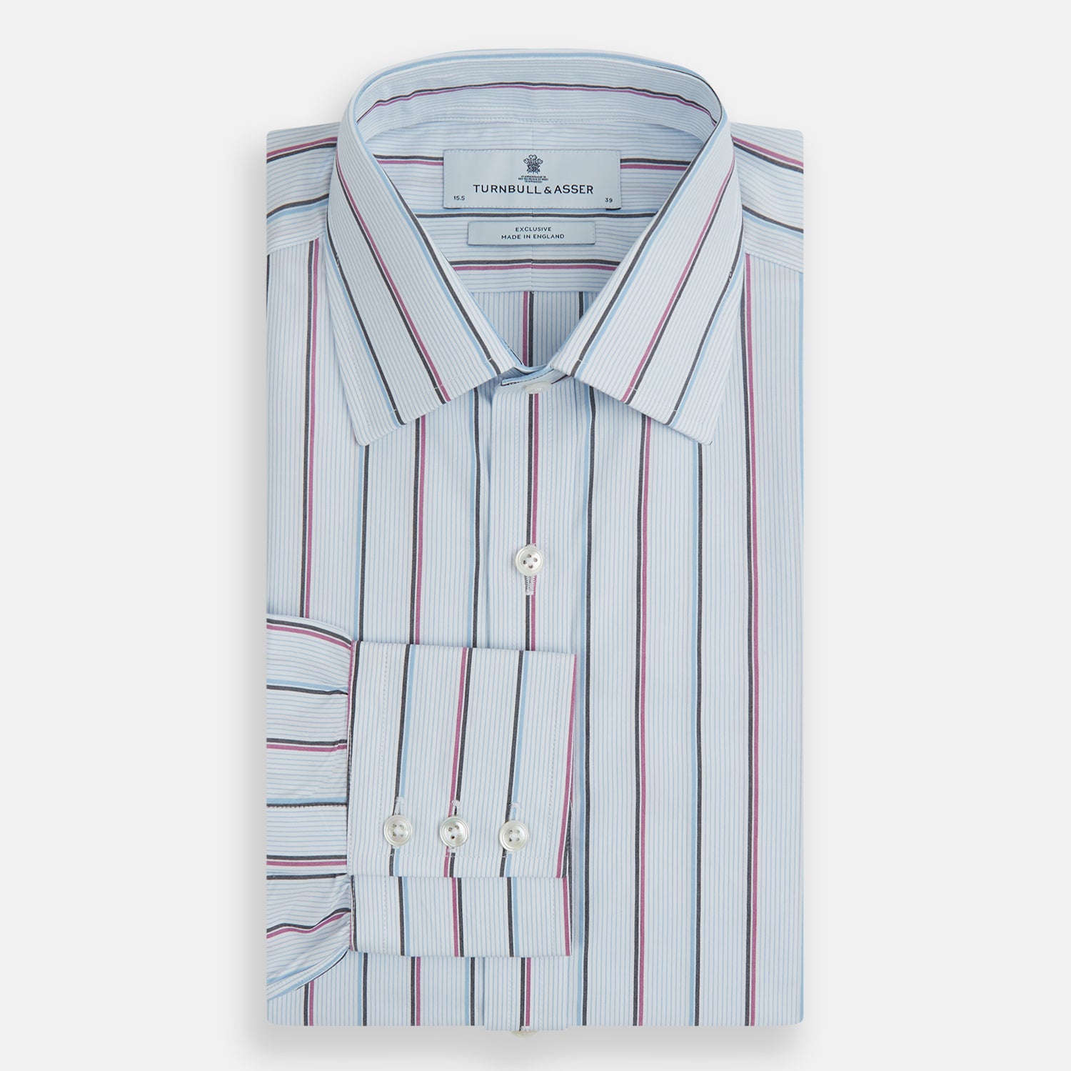 View 4 of product The Blue and Pink Shadow Stripe Mayfair Shirt by Turnbull & Asser features a T&A collar, long sleeves, buttoned cuffs, and a relaxed fit. Made from organic cotton with blue and pink shadow stripes for effortless style.