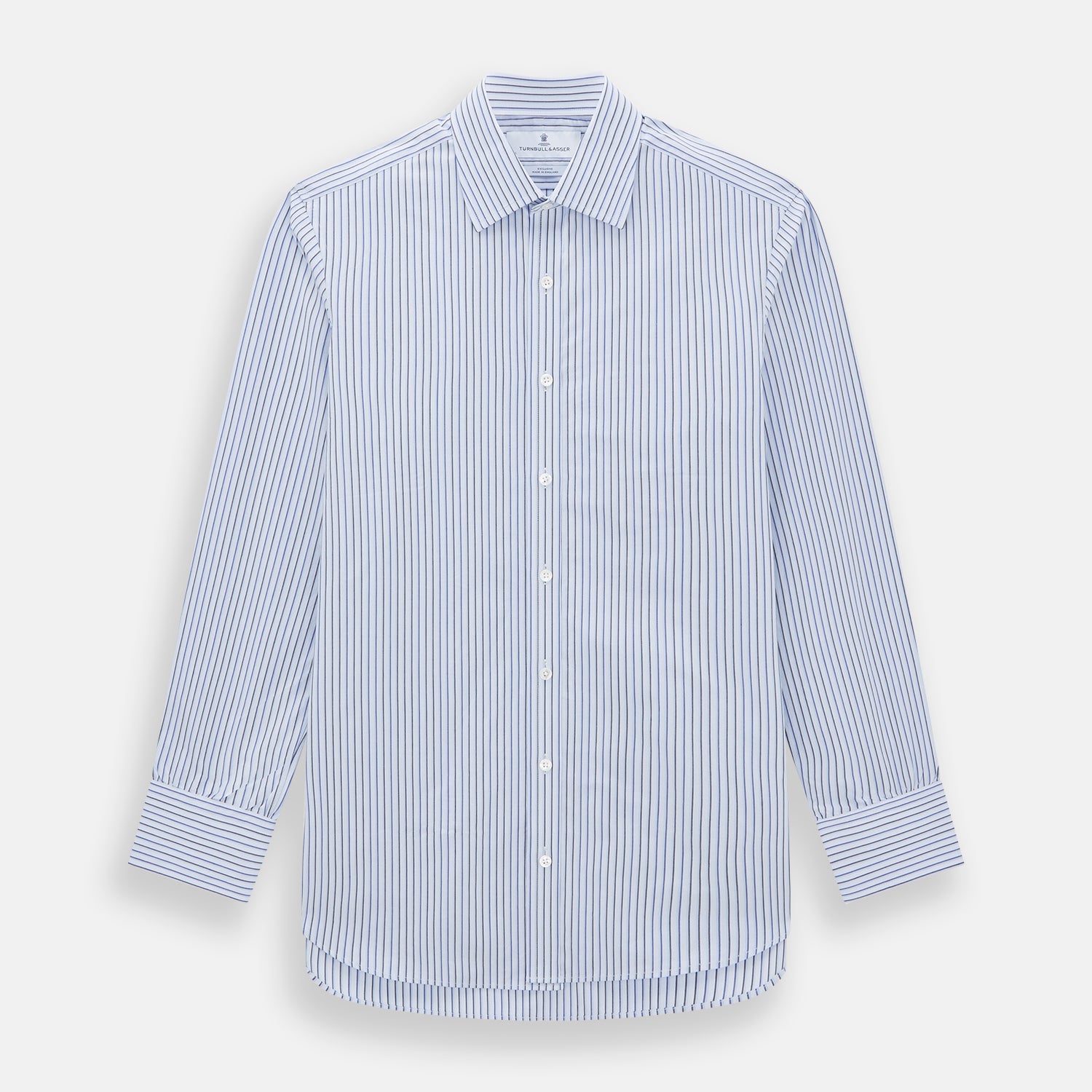 View 1 of product The Blue Shadow Pinstripe Mayfair Shirt by Turnbull & Asser is a long-sleeve, organic cotton dress shirt with light blue and white vertical stripes, a collar, and button-down front, shown against a white background.