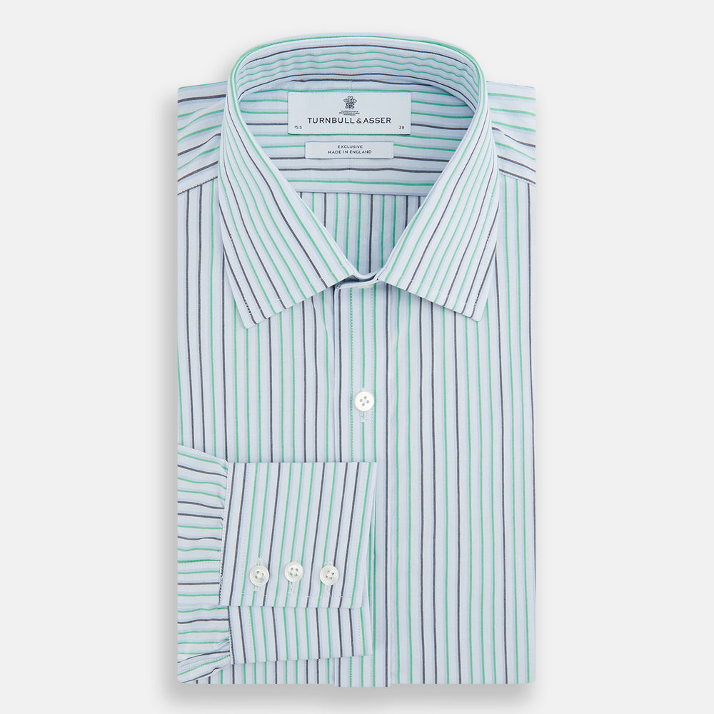 The Green and Blue Shadow Pinstripe Mayfair Shirt by Turnbull & Asser features long sleeves, a pointed collar, white buttons, and subtle green and blue pinstripes—a refined choice for any wardrobe capsule.