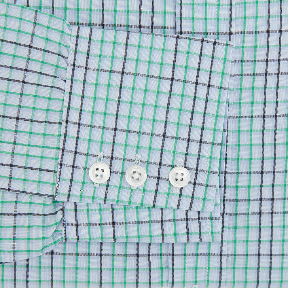 The Turnbull & Asser Green and Blue Shadow Check Mayfair Shirt is a long-sleeve button-down with a T&A collar, made from organic cotton in a blue, green, and white plaid pattern, shown on a white background.