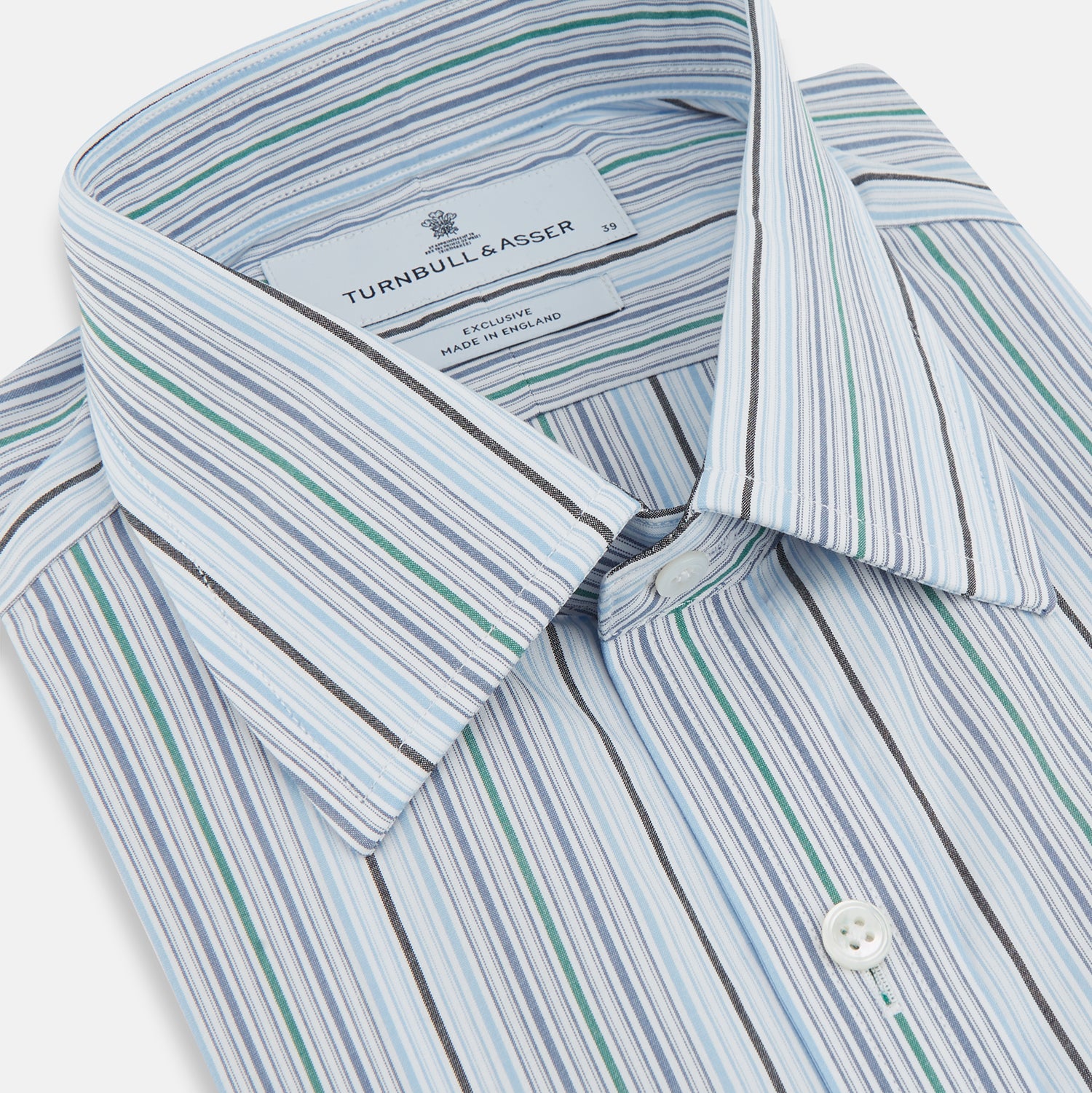 View 2 of product The Turnbull & Asser Blue and Green Multi Track Stripe Mayfair Shirt is a contemporary classic long-sleeve collared shirt, shown expertly laid flat on a white background—a versatile essential for any capsule wardrobe.