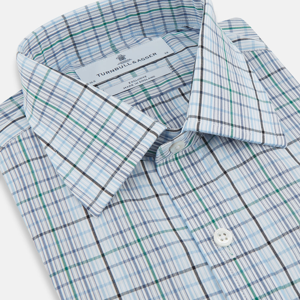 The Turnbull & Asser Blue and Green Multi Check Mayfair Shirt, a long-sleeve button-up with a blue and green plaid pattern on white, is displayed flat against a white surface.
