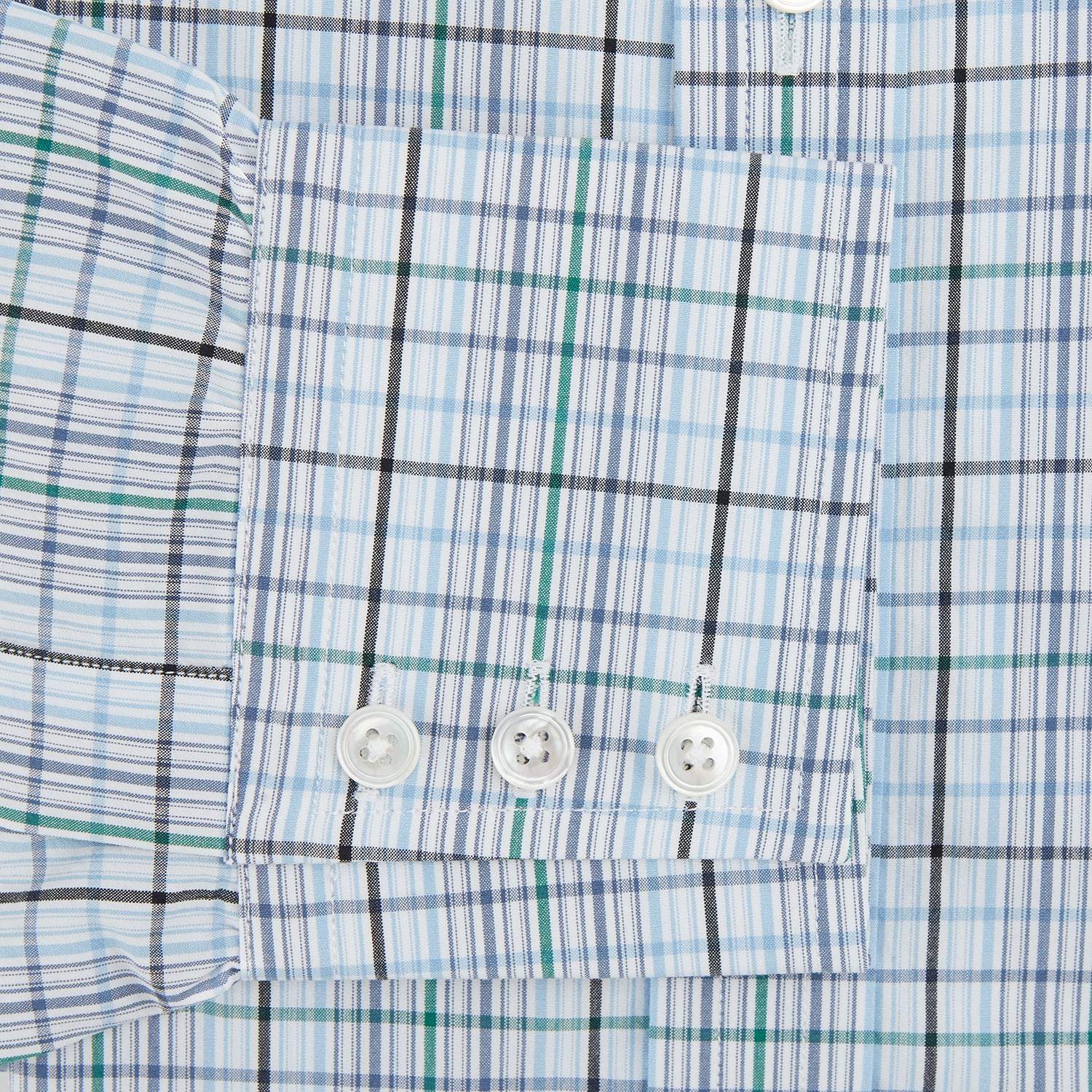View 3 of product The Turnbull & Asser Blue and Green Multi Check Mayfair Shirt, a long-sleeve button-up with a blue and green plaid pattern on white, is displayed flat against a white surface.