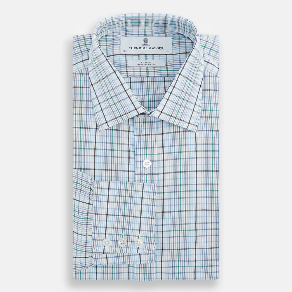 The Turnbull & Asser Blue and Green Multi Check Mayfair Shirt, a long-sleeve button-up with a blue and green plaid pattern on white, is displayed flat against a white surface.