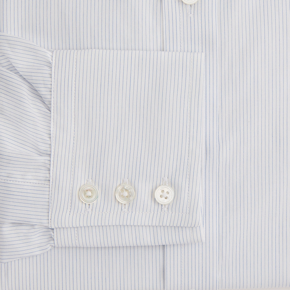 The Blue Pencil Stripe Mayfair Shirt by Turnbull & Asser features light blue stripes, long sleeves, a classic T&A collar, and buttoned cuffs, displayed on a plain white background.