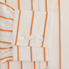 View 3 of product The Orange Track Stripe Mayfair Shirt by Turnbull & Asser features a white base with vertical orange stripes in breathable cotton, plus contrasting horizontal-striped collar and cuffs, shown neatly laid flat on a white background.