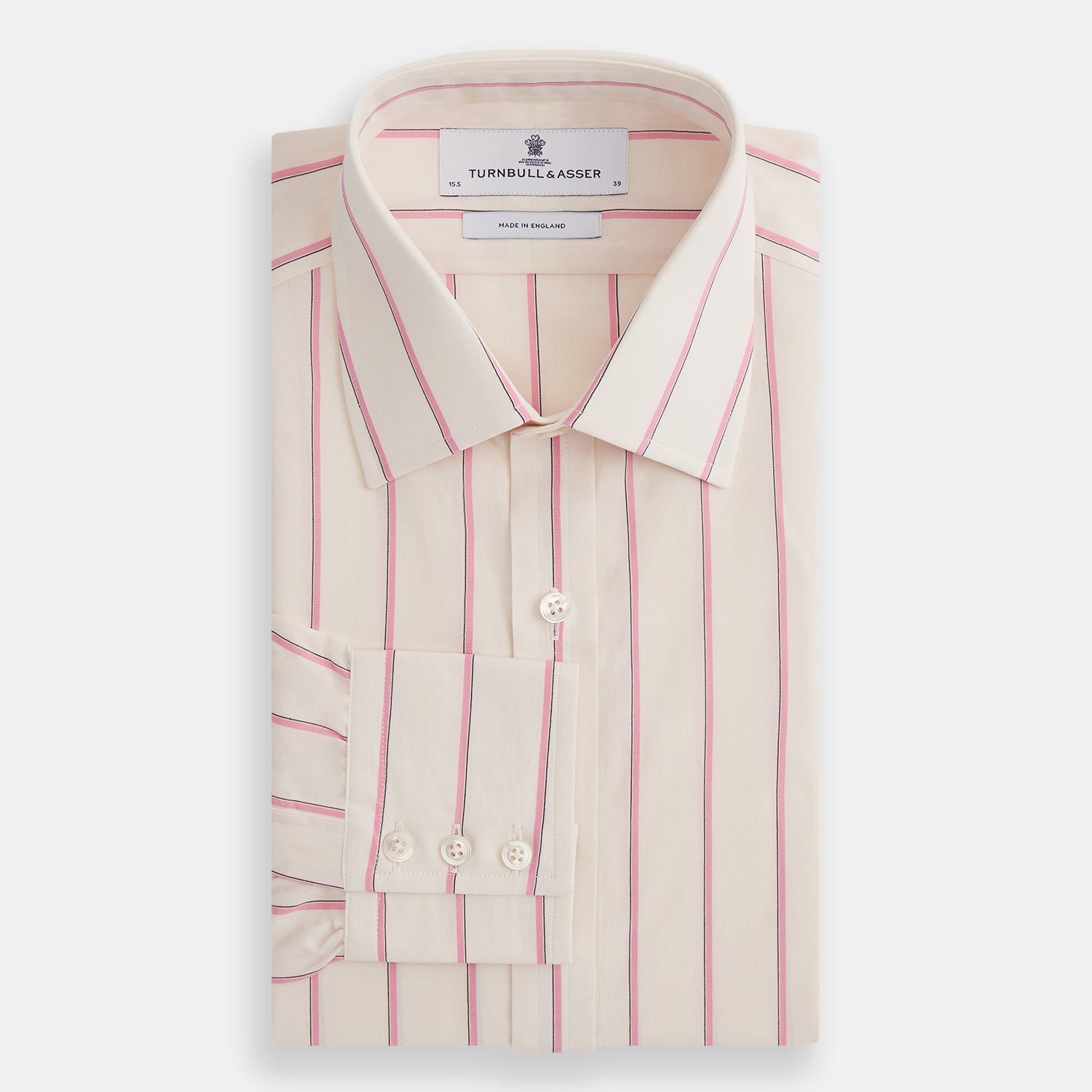 View 4 of product The Turnbull & Asser Pink Track Stripe Mayfair Shirt features long sleeves, a collar, and cream fabric with vertical pink stripes, crafted from breathable cotton and shown on a plain white background.