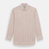 View 1 of product The Turnbull & Asser Pink Track Stripe Mayfair Shirt features long sleeves, a collar, and cream fabric with vertical pink stripes, crafted from breathable cotton and shown on a plain white background.