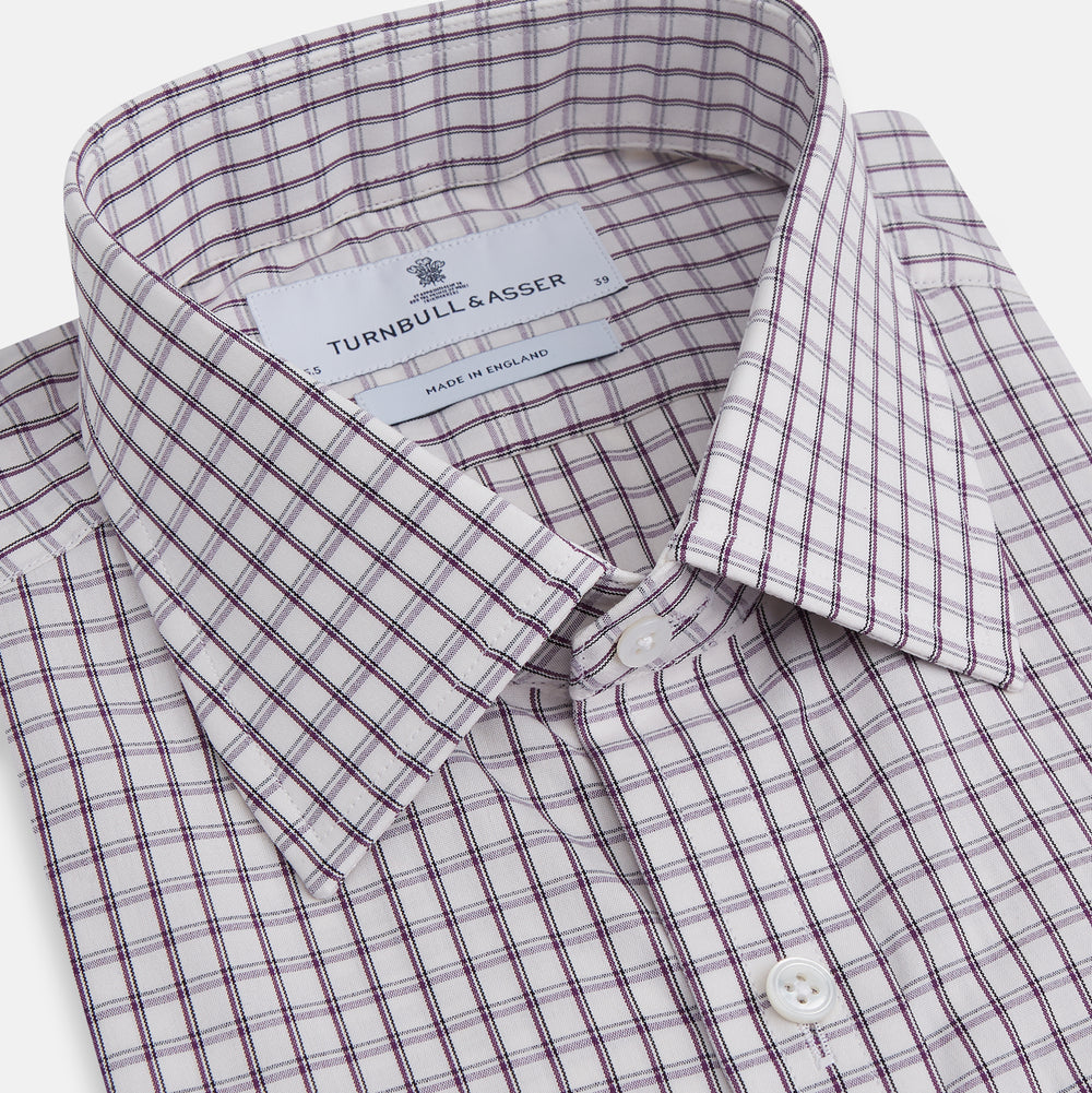 The Turnbull & Asser Purple Tattersall Check Mayfair Shirt is a long-sleeved, organic cotton button-up with a pointed collar and buttoned cuffs, shown flat on a white background.