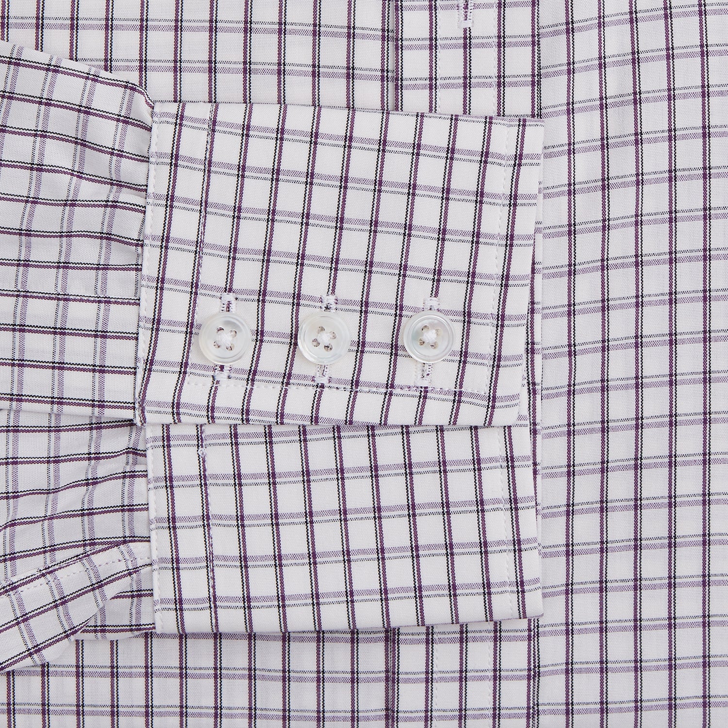 View 3 of product The Turnbull & Asser Purple Tattersall Check Mayfair Shirt is a long-sleeved, organic cotton button-up with a pointed collar and buttoned cuffs, shown flat on a white background.