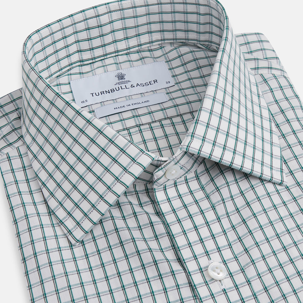 A Turnbull & Asser Dark Green Tattersall Check Mayfair Shirt, featuring long sleeves and button-down design, is neatly laid flat on a white background.