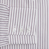 View 3 of product The Turnbull & Asser Purple Track Stripe Mayfair Shirt is a long-sleeve, button-up organic cotton shirt with a T&A collar, showcasing thin vertical black stripes on white and laid flat on a white surface.