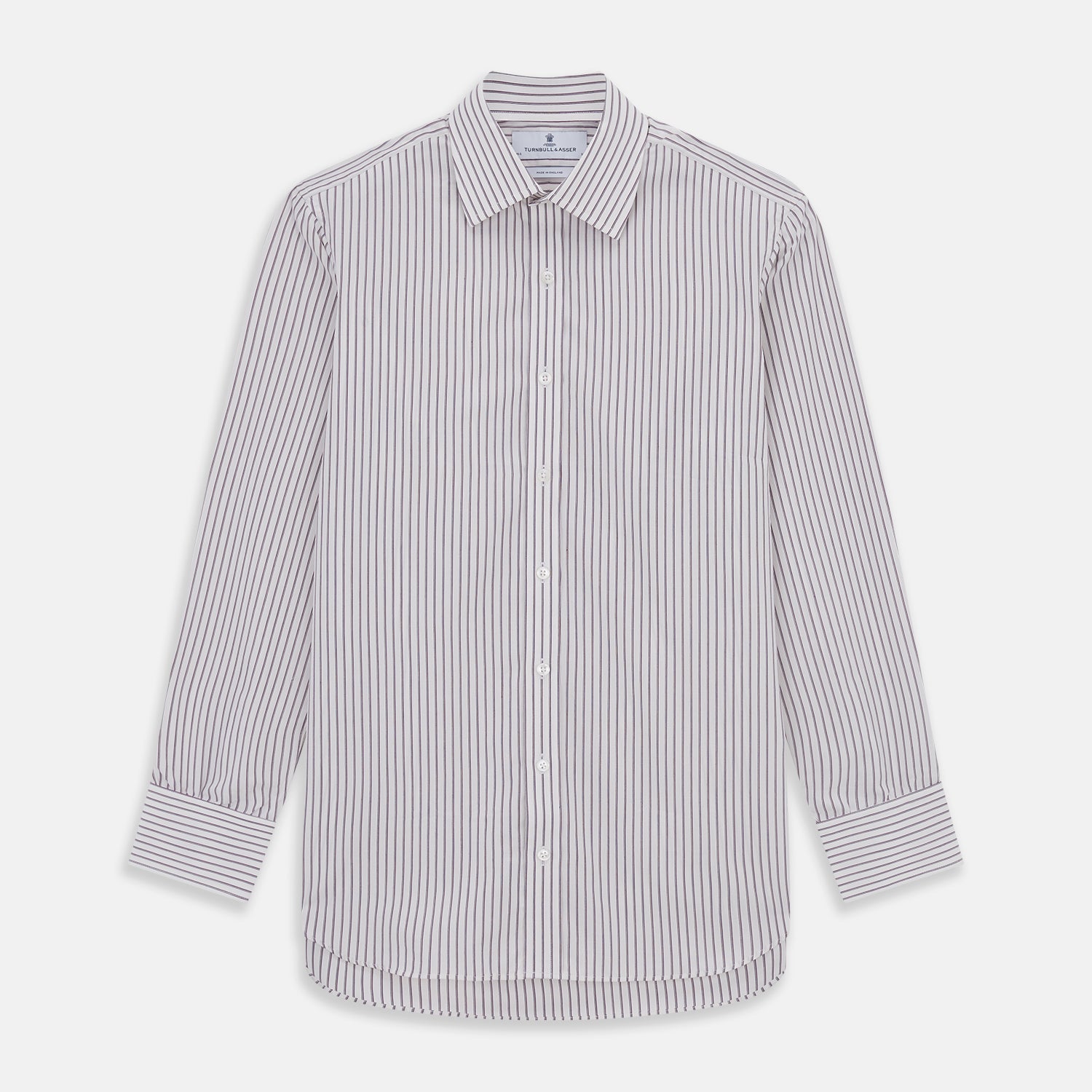 View 1 of product The Turnbull & Asser Purple Track Stripe Mayfair Shirt is a long-sleeve, button-up organic cotton shirt with a T&A collar, showcasing thin vertical black stripes on white and laid flat on a white surface.