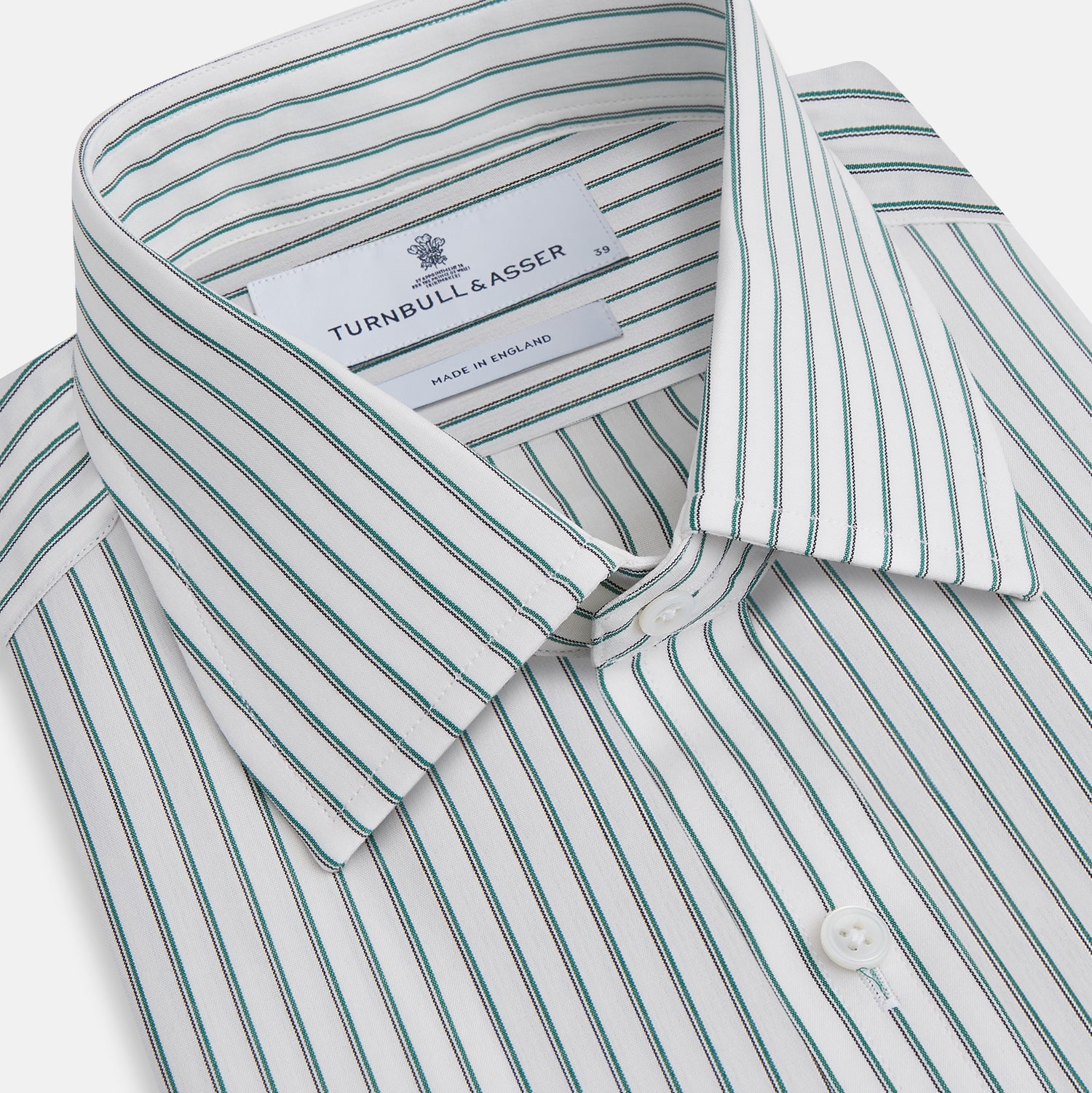 View 2 of product The Turnbull & Asser Dark Green Track Stripe Mayfair Shirt is a long-sleeved button-up with a T&A collar, featuring dark green track stripes, shown against a plain white background.
