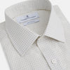 View 2 of product The Turnbull & Asser Pale Blue Graph Check Mayfair Shirt is a long-sleeve, button-up shirt with a pointed collar and buttoned cuffs, crafted from organic cotton—shown here laid flat on a white background.