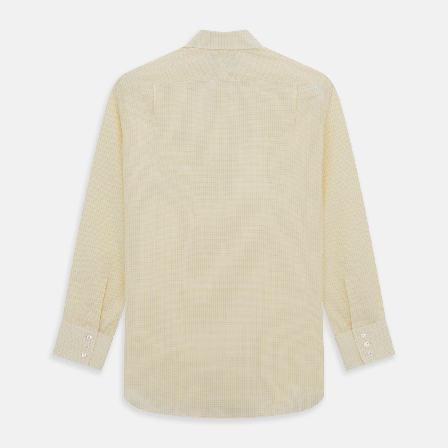 View 5 of product The Turnbull & Asser Yellow Graph Check Mayfair Shirt features long sleeves, a button-up front, and classic T&A collar in organic cotton with a light yellow check pattern—a summer staple shown on a plain white background.