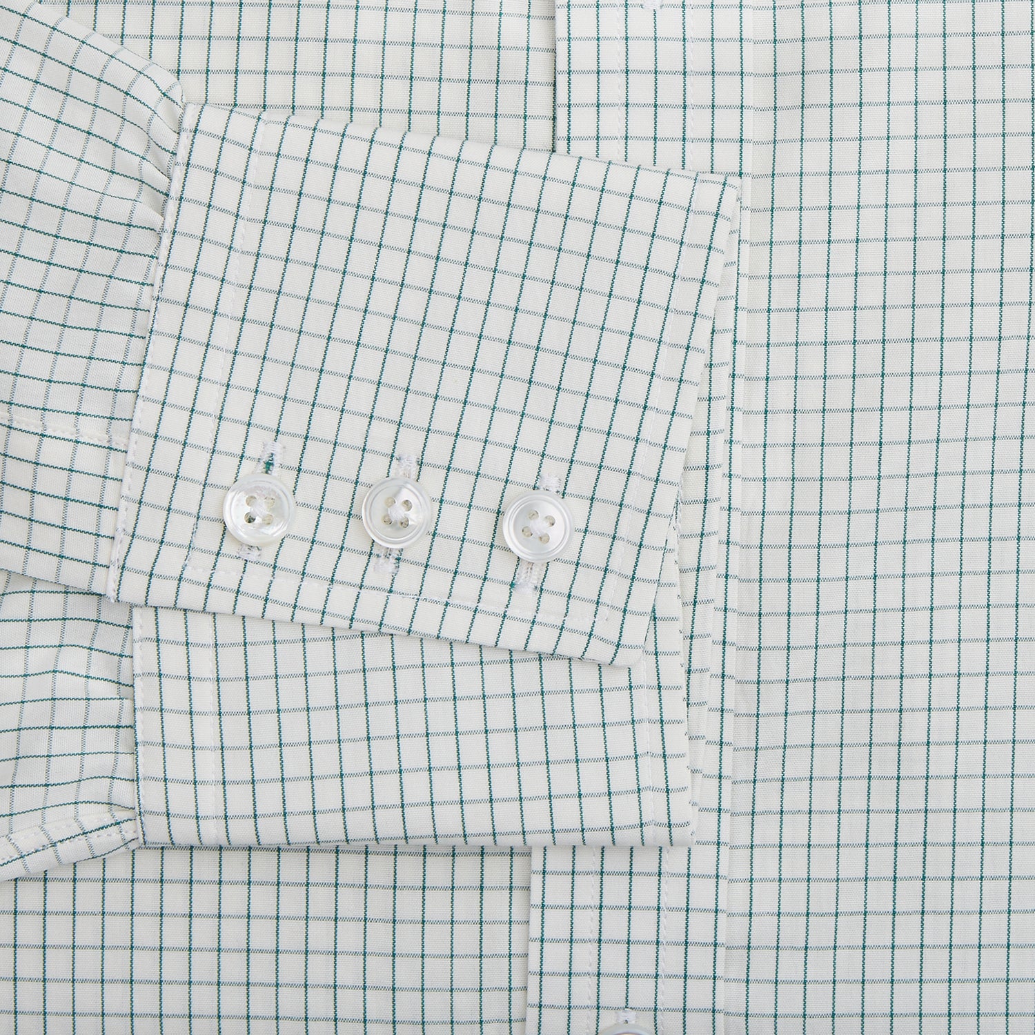 View 3 of product The Turnbull & Asser Dark Green Graph Check Mayfair Shirt, featuring a classic T&A collar and cuffs, displays a small green and white check pattern and is shown laid flat on a white background.