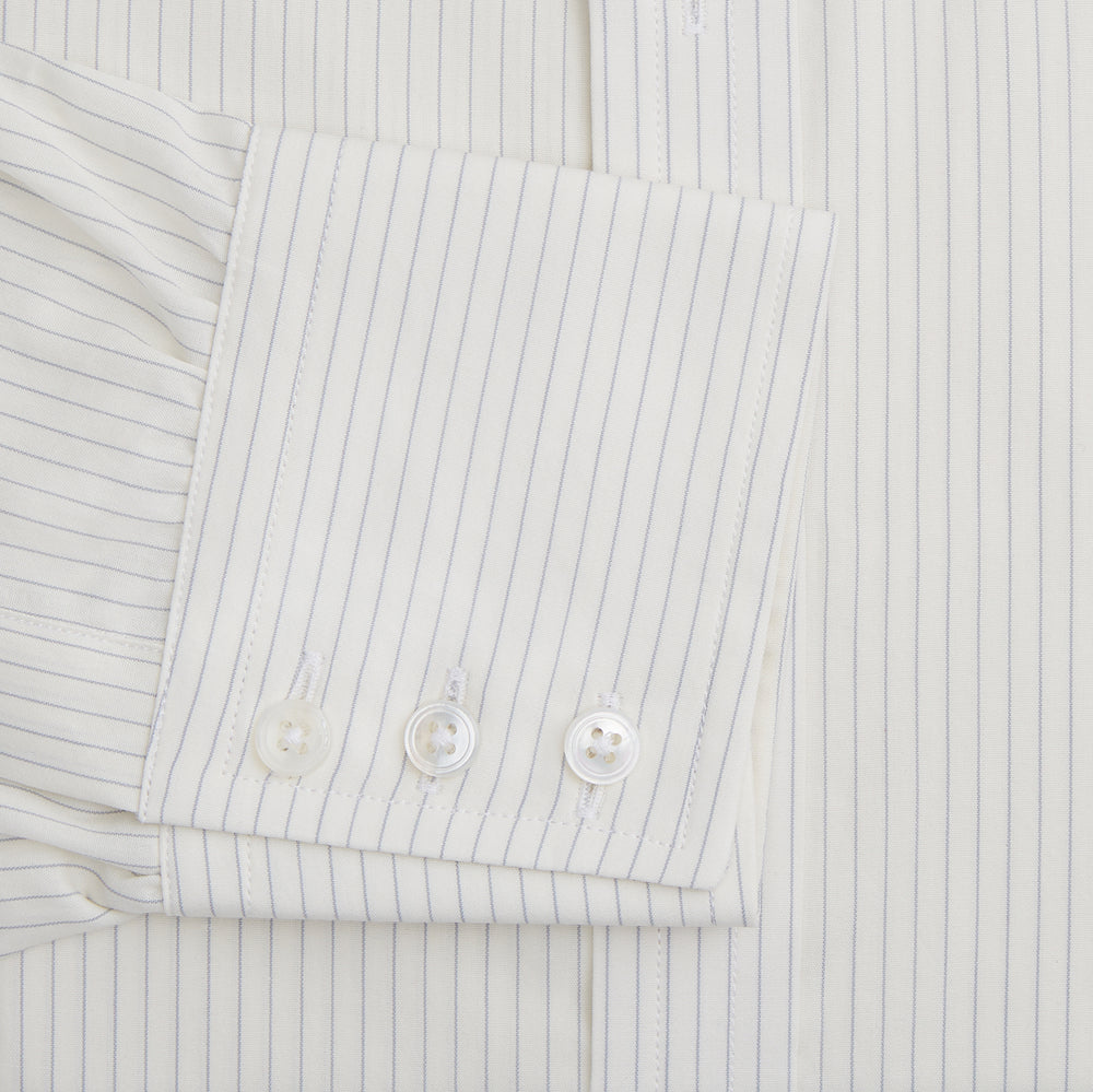 The Turnbull & Asser Pale Blue Pinstripe Mayfair Shirt is a long-sleeve, collared, button-up made from organic cotton with a subtle pale blue and white pinstripe pattern, shown against a plain white background.