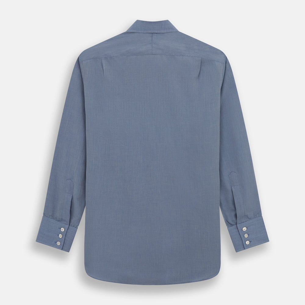 The Blue Mayfair Shirt by Turnbull & Asser is a long-sleeve, textured blue shirt with a classic T&A collar and white buttons, crafted from organic cotton and shown against a plain white background.