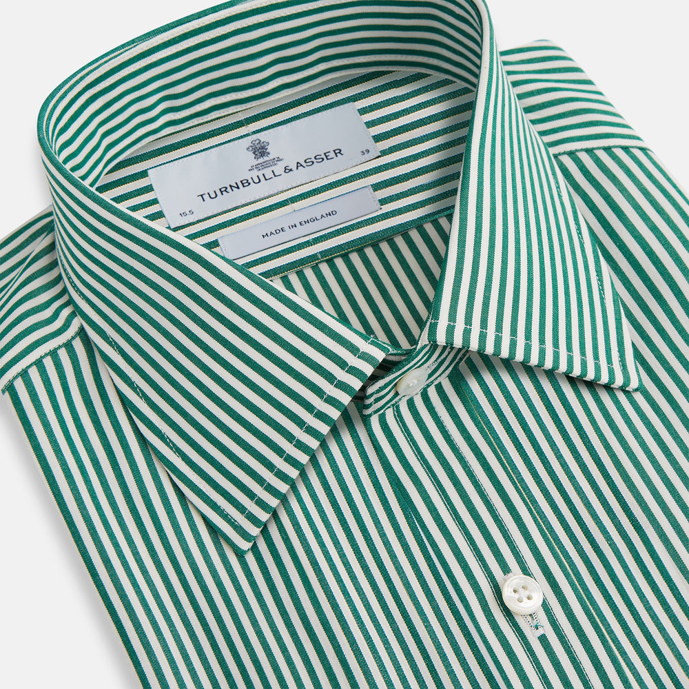 The Dark Green Bengal Stripe Mayfair Shirt by Turnbull & Asser is a long-sleeve, breathable cotton button-up with a pointed collar and buttoned cuffs on a white background.