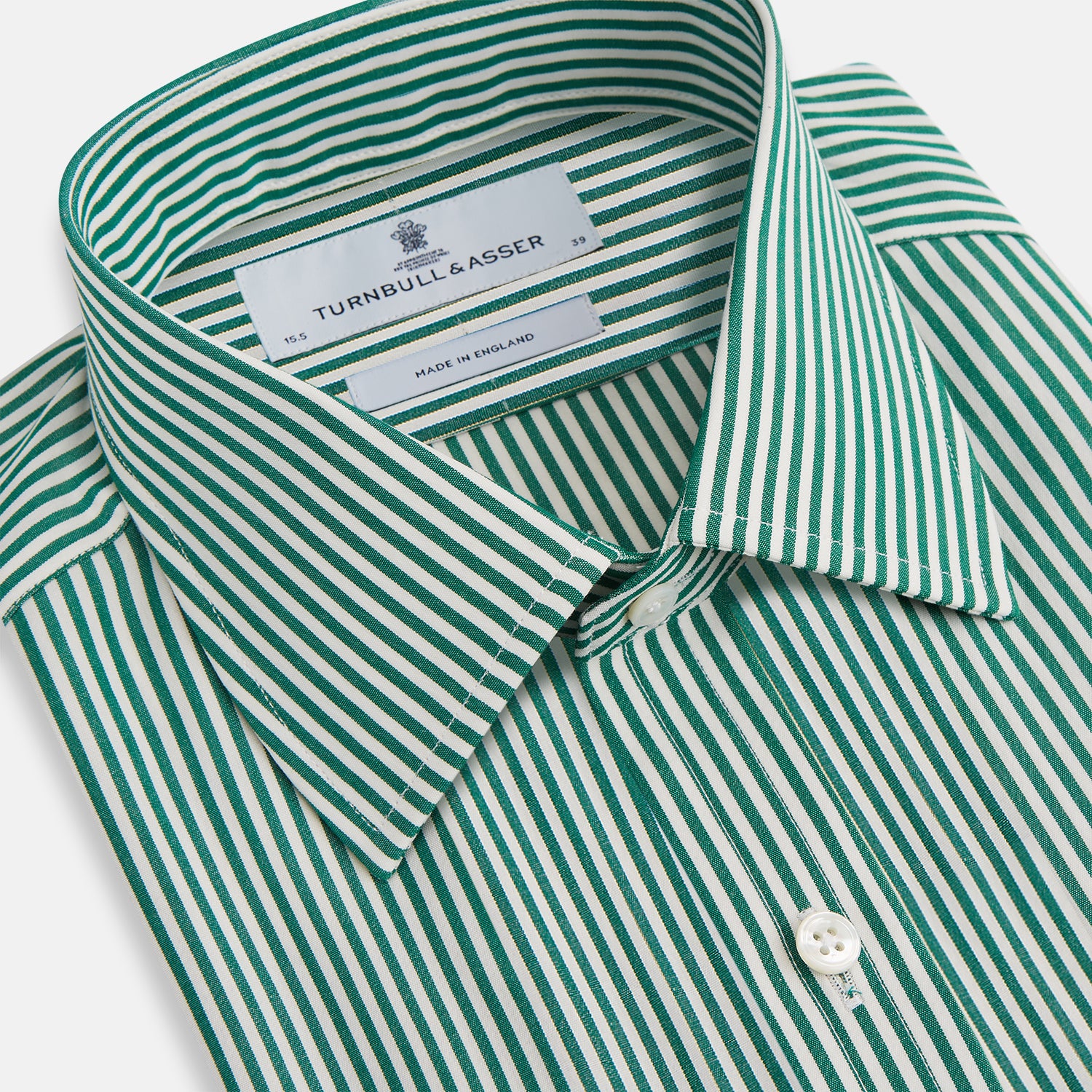 View 2 of product The Dark Green Bengal Stripe Mayfair Shirt by Turnbull & Asser is a long-sleeve, breathable cotton button-up with a pointed collar and buttoned cuffs on a white background.