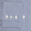 View 3 of product The Turnbull & Asser Blue Pencil Stripe Mayfair Shirt is crafted from organic cotton with a classic collar, white buttons, and buttoned cuffs. Shown laid flat on a white background.