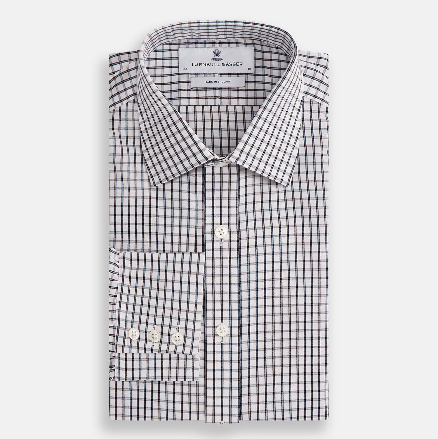 View 4 of product The Turnbull & Asser Midnight Blue Double Graph Check Mayfair Shirt features a pointed collar and buttoned cuffs. Crafted from breathable cotton, this stylish shirt ensures comfort and is shown against a white background.