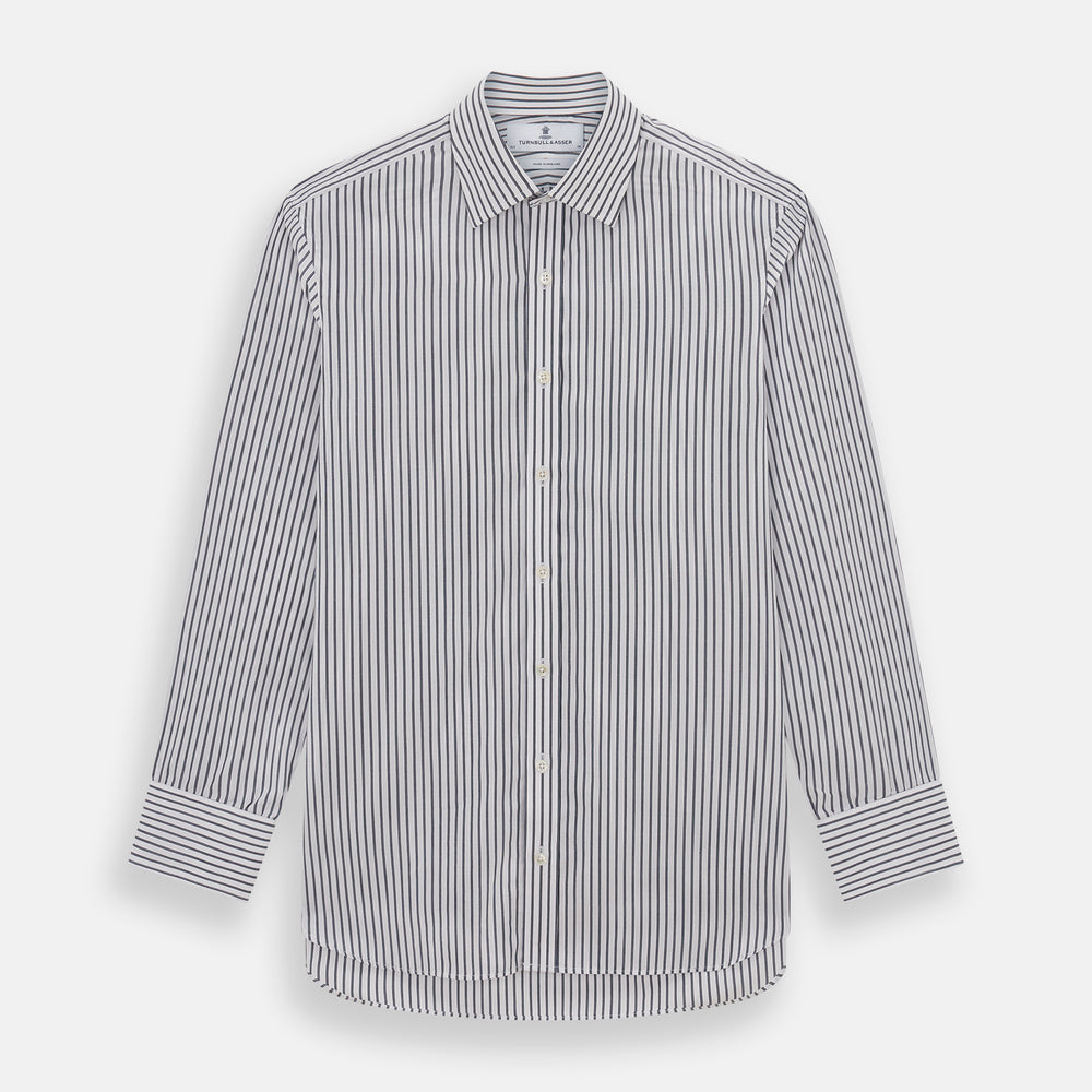 The Turnbull & Asser Midnight Blue Halo Stripe Mayfair Shirt features breathable cotton with black and white vertical stripes, a pointed T&A collar, and buttoned cuffs, displayed flat on a white background.