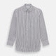 The Turnbull & Asser Midnight Blue Halo Stripe Mayfair Shirt features breathable cotton with black and white vertical stripes, a pointed T&A collar, and buttoned cuffs, displayed flat on a white background.