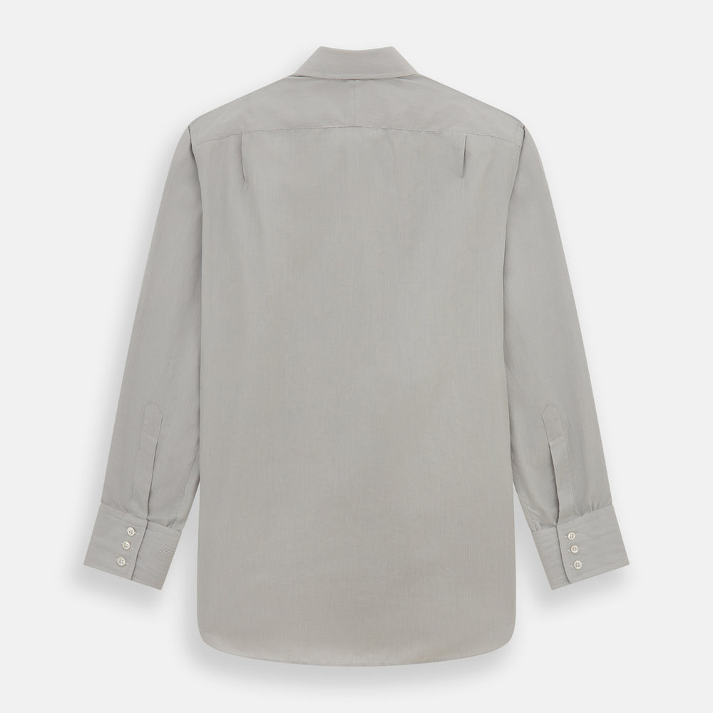 The Turnbull & Asser Pale Blue Fine Stripe Mayfair Shirt features a classic collar, white buttons, cuffs, a slightly curved hem, and subtle pale blue stripes for a formal tailored look. Displayed on a plain white background.