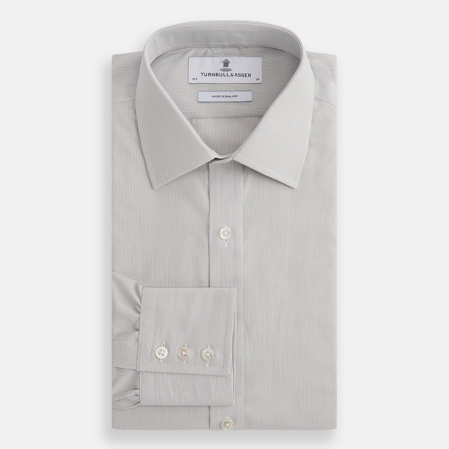 View 4 of product The Turnbull & Asser Pale Blue Fine Stripe Mayfair Shirt features a classic collar, white buttons, cuffs, a slightly curved hem, and subtle pale blue stripes for a formal tailored look. Displayed on a plain white background.
