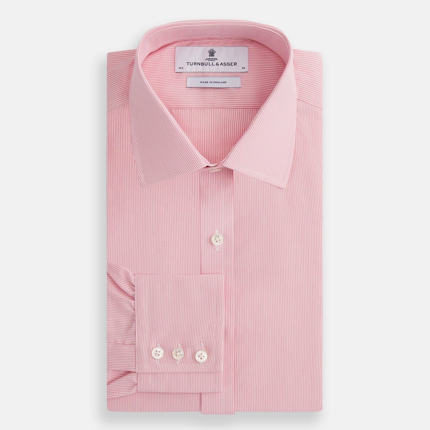 View 5 of product The Pink Fine Stripe Mayfair Shirt by Turnbull & Asser features fine white stripes, a classic T&A collar, visible white button, and is made from organic cotton in England.