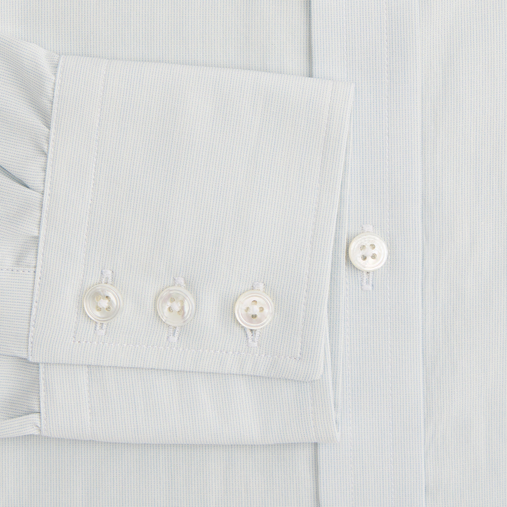 Pale Blue Pencil Stripe Mayfair Shirt by Turnbull & Asser featuring a classic collar, white buttons, and cuffed long sleeves, displayed flat on a white background.