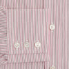 View 3 of product The Turnbull & Asser Pink Fine Shadow Stripe Mayfair Shirt is a long-sleeved button-up with a classic T&A collar, crafted from pure cotton and featuring thin pink and white vertical stripes, shown on a plain white background.