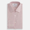 View 4 of product The Turnbull & Asser Pink Fine Shadow Stripe Mayfair Shirt is a long-sleeved button-up with a classic T&A collar, crafted from pure cotton and featuring thin pink and white vertical stripes, shown on a plain white background.