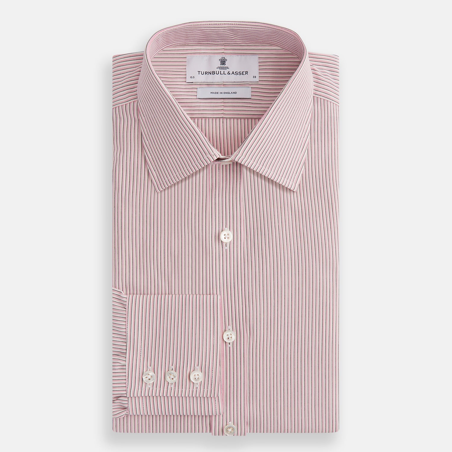 View 4 of product The Turnbull & Asser Pink Fine Shadow Stripe Mayfair Shirt is a long-sleeved button-up with a classic T&A collar, crafted from pure cotton and featuring thin pink and white vertical stripes, shown on a plain white background.
