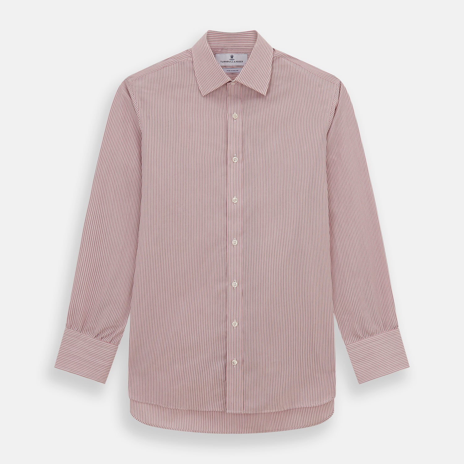 View 1 of product The Turnbull & Asser Pink Fine Shadow Stripe Mayfair Shirt is a long-sleeved button-up with a classic T&A collar, crafted from pure cotton and featuring thin pink and white vertical stripes, shown on a plain white background.