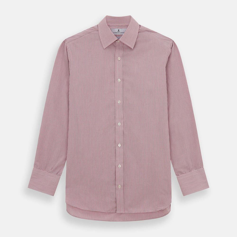 The Turnbull & Asser Pink Fine Graph Check Mayfair Shirt features long sleeves, breathable cotton, a pointed collar, 3-button cuffs, white buttons, and a red and white check pattern—shown on a plain white background.